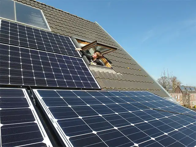 Solar Lithium Battery Applications Solar panels on a house roof, an application for solar lithium batteries